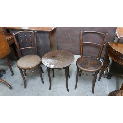 125 - A beech bentwood occasional table and two chairs