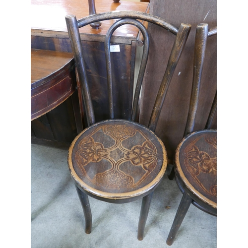 128 - A set of three Art Nouveau beech bentwood chairs