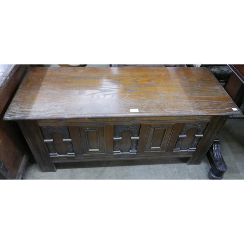 138 - A 17th Century style carved oak blanket box