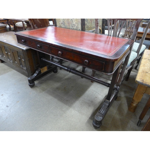 139 - A William IV mahogany and red leather topped two drawer writing table