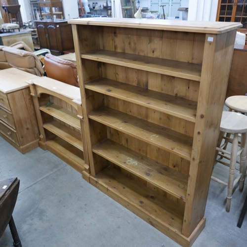 143 - Two pine open bookcases