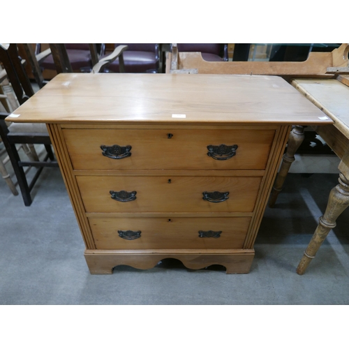 144 - An Edward VII satin birch chest of drawers