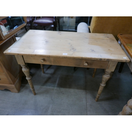 145 - A Victorian style pine single drawer kitchen table