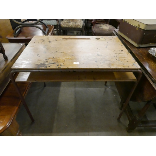 194 - A vintage plywood and tubular steel desk