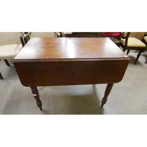 196 - A Victorian mahogany Pembroke table