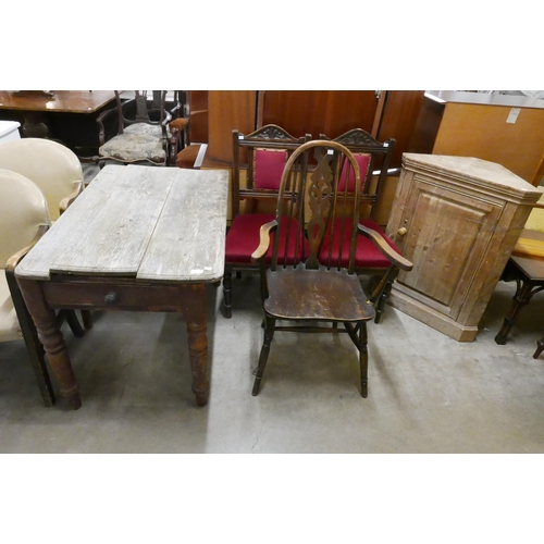 198 - A pine single drawer kitchen table, a pine wall hanging corner cupboard and three assorted chairs