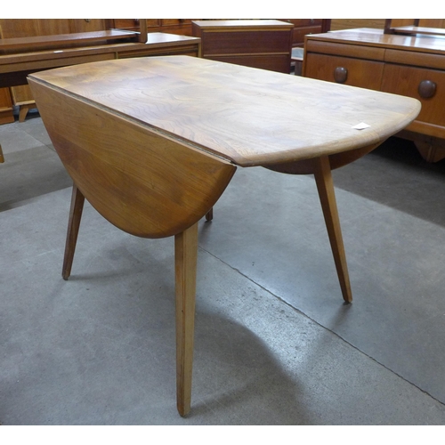 2 - An Ercol elm and beech Windsor drop-leaf table