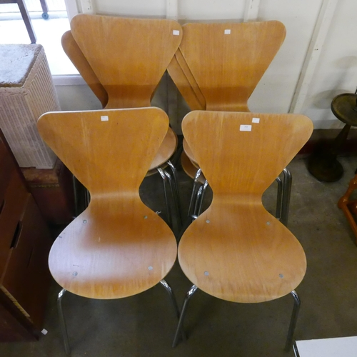 202 - A set of eight Fritz Hanson style chrome and bent plywood stacking chairs