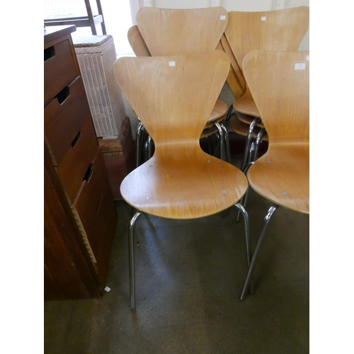 202 - A set of eight Fritz Hanson style chrome and bent plywood stacking chairs