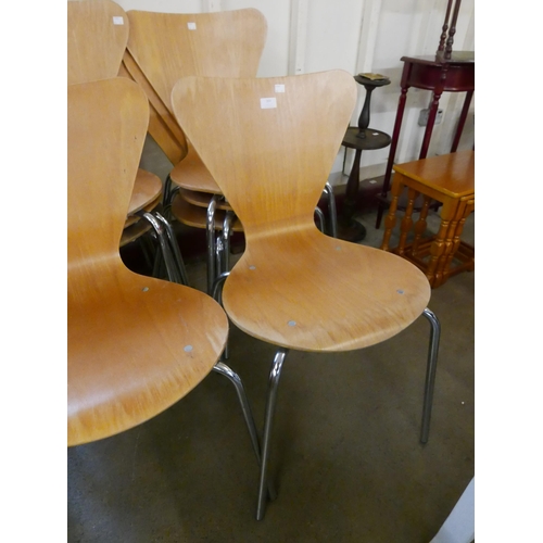 202 - A set of eight Fritz Hanson style chrome and bent plywood stacking chairs