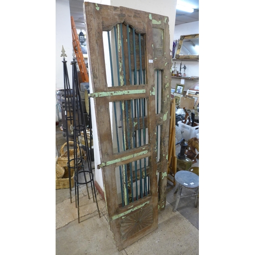 222 - A pair of Indian hardwood shutter doors