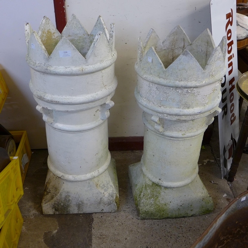 226 - Two painted terracotta crown top chimney-pots