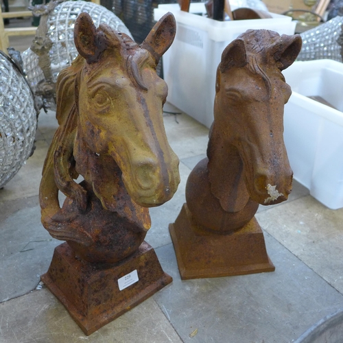 229 - A pair of cast iron horse head garden ornaments