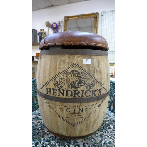 237 - A beech and brown leather topped Hendrick's Gin advertising stool