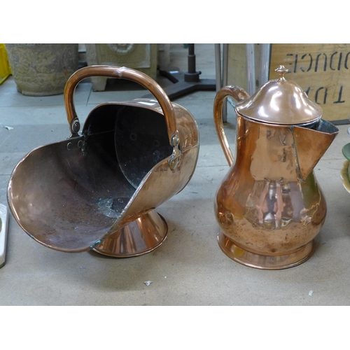 255 - A Victorian copper coal scuttle and a large jug and cover