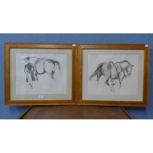 264 - A pair of signed L. Kieman limited edition prints of horses, framed