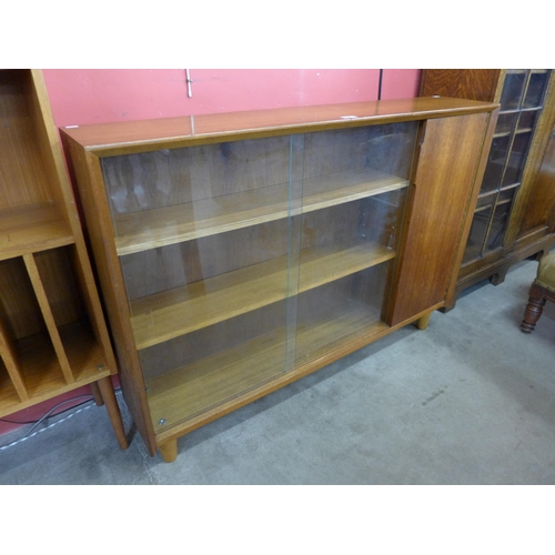 27 - A teak bookcase