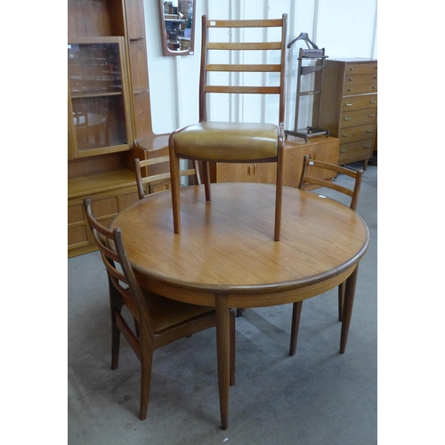 28 - A G-Plan Fresco teak extending dining table and four chairs