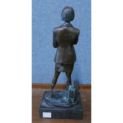 282 - A bronze figure of a female office worker