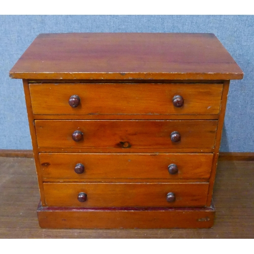 286 - A small Victorian style pine apprentice chest of drawers