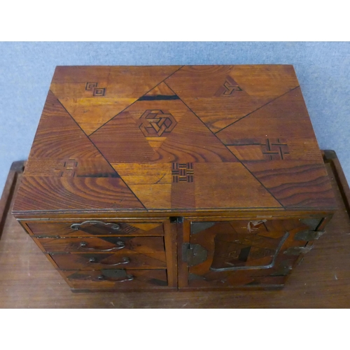 287 - A Japanese inlaid wooden table top kodansu cabinet