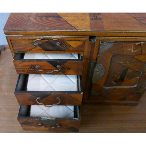 287 - A Japanese inlaid wooden table top kodansu cabinet