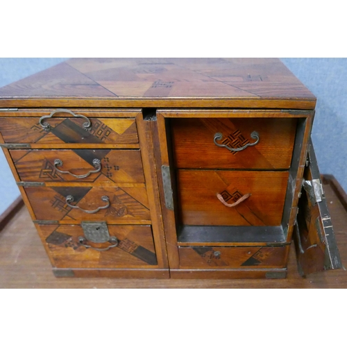 287 - A Japanese inlaid wooden table top kodansu cabinet