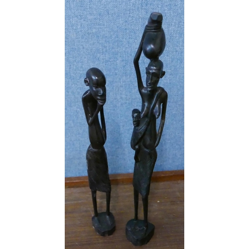 291 - An African wooden knobkerry and two carved figures