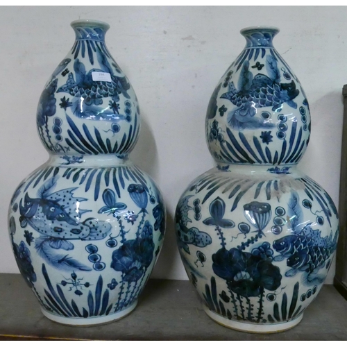 294 - A pair of large Chinese blue and white double gourd shaped porcelain vases