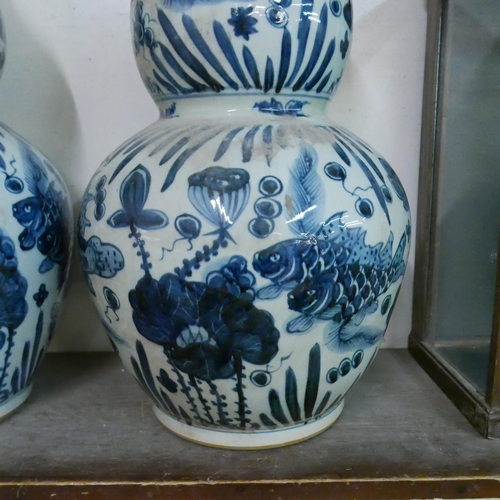 294 - A pair of large Chinese blue and white double gourd shaped porcelain vases