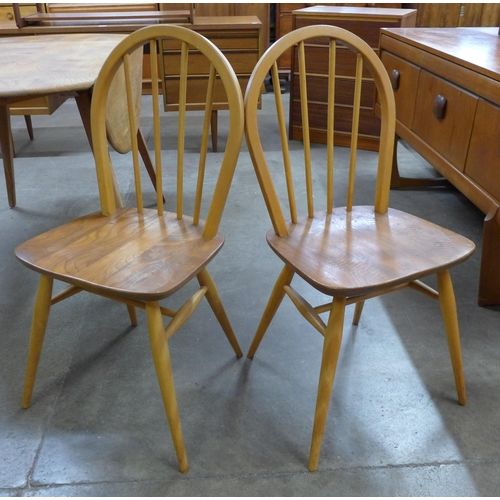 2B - A pair of Ercol elm and beech Windsor chairs