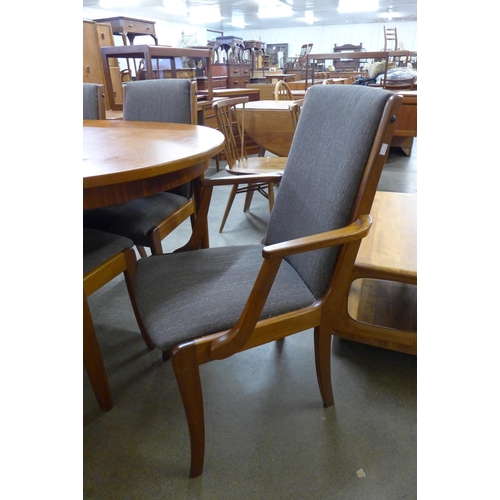 3 - A McIntosh teak extending dining table and six chairs