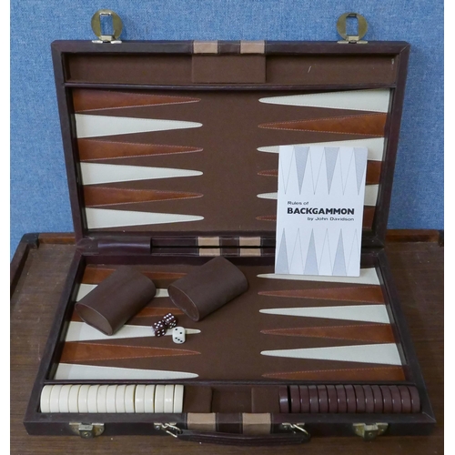 302 - A cased backgammon set