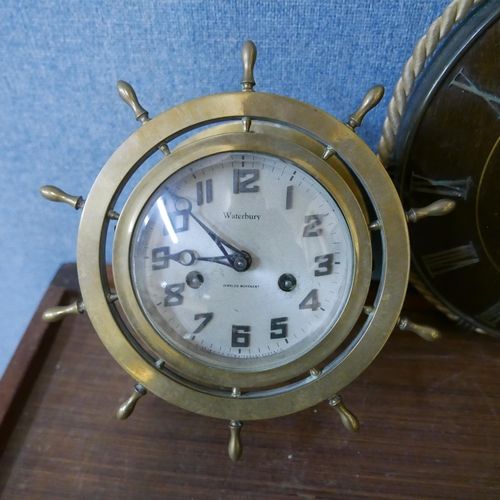 303 - A Waterbury brass ship's wheel wall clock and two others