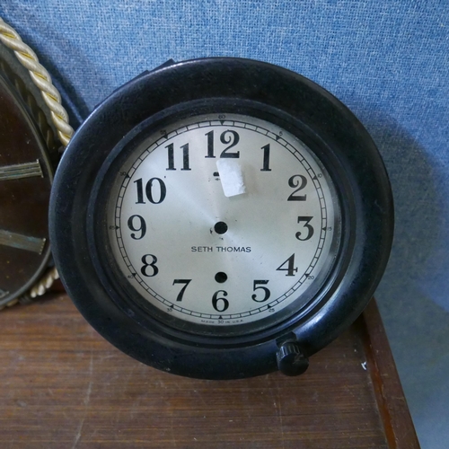 303 - A Waterbury brass ship's wheel wall clock and two others