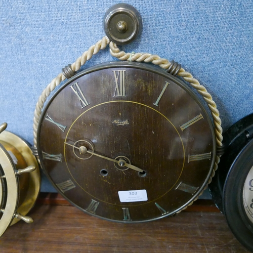 303 - A Waterbury brass ship's wheel wall clock and two others