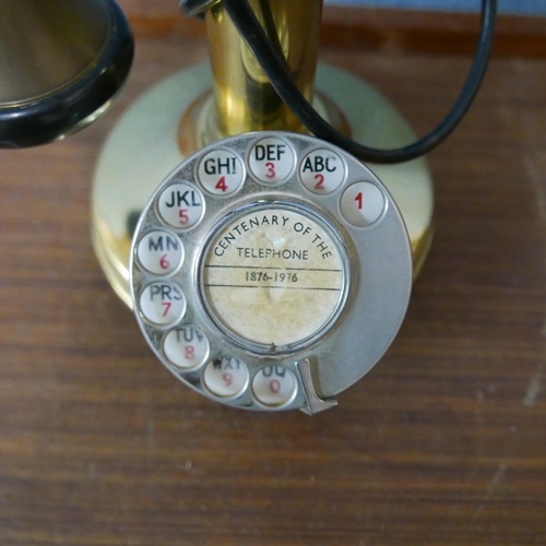 306 - A brass candlestick telephone