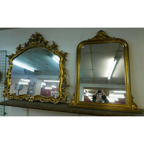 313 - A Rococo style gilt framed overmantel mirror and one other