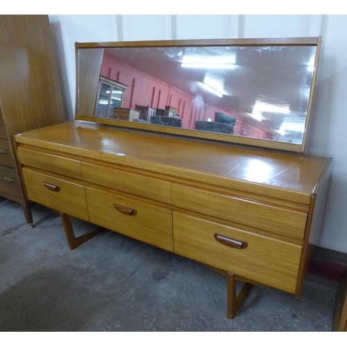 32 - A teak dressing table