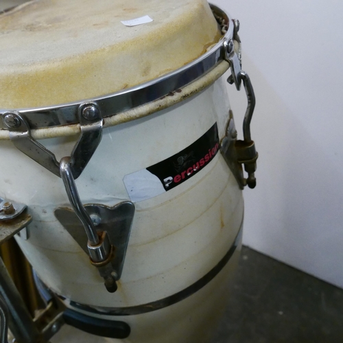 321 - A pair of percussion drums on stand