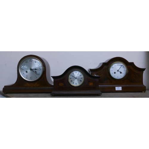 335 - Three early 20th Century inlaid mahogany mantel clocks