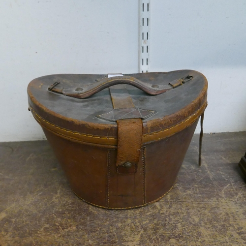 337 - A Victorian leather silk lined top hat box