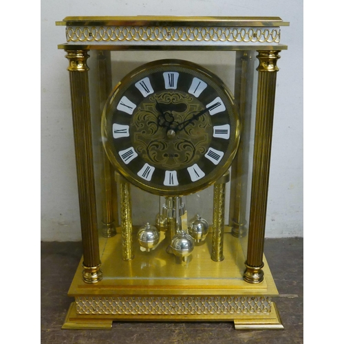 340 - A gilt metal anniversary clock