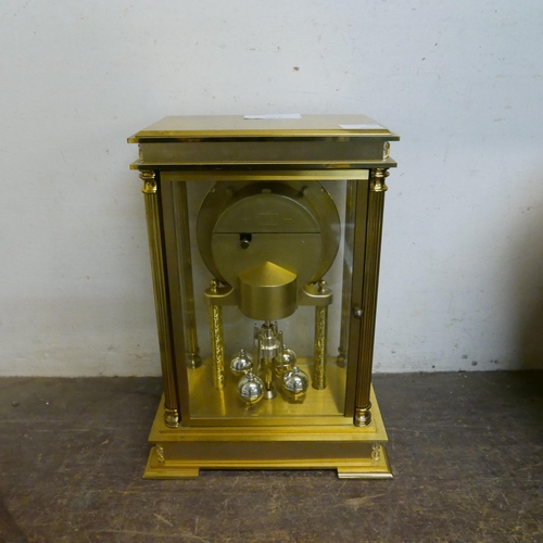 340 - A gilt metal anniversary clock