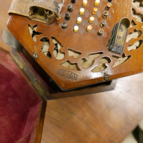 345 - A 19th Century Wheatstone musical concertina squeeze box, with ivory keys, a/f. With non-transferabl... 