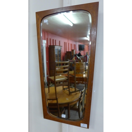 40 - A teak framed mirror