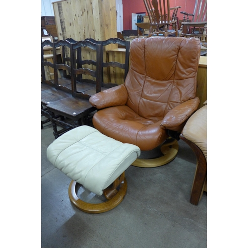 43A - A Norwegian Ekorness beech and leather revolving lounge chair and an ottoman