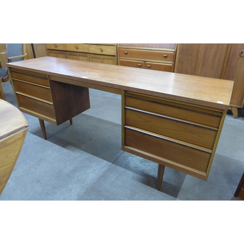 5 - An Austin Suite teak desk