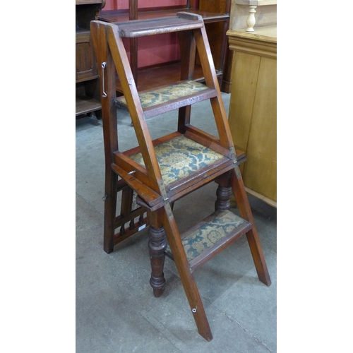 57 - A Victorian Aesthetic Movement mahogany metamorphic library chair/step, inset with Mintons style til... 