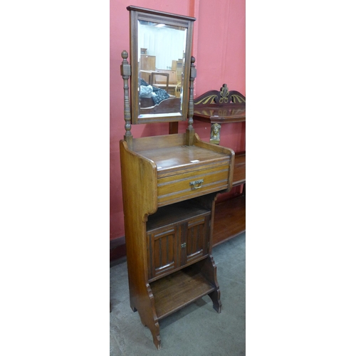 59 - A Victorian Aesthetic Movement gentleman's mahogany shaving stand